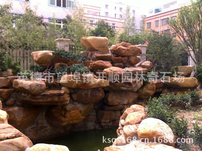 专业设计、制造大小黄腊石假山、黄蜡石鱼池水景