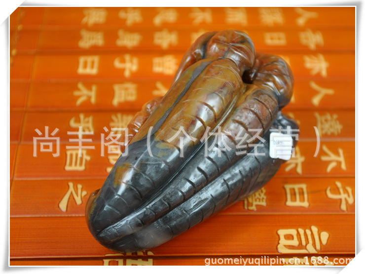 天然黄龙玉手把件 玉石把件 寓意抓住机遇图片