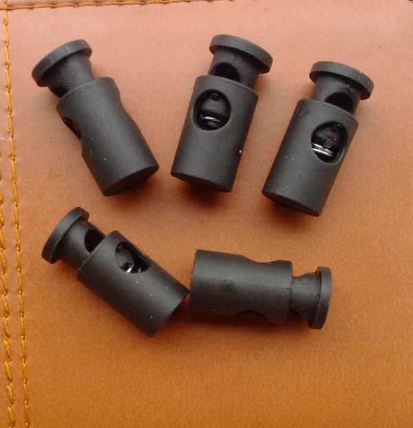 扣-现货供应塑料线弹簧扣 箱包绳纽扣 松紧扣猪