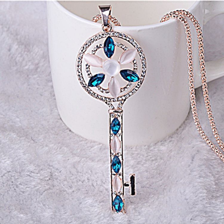 <em>韩版毛衣</em>链<em>批发</em> 韩国高档女款钥匙猫眼石长款