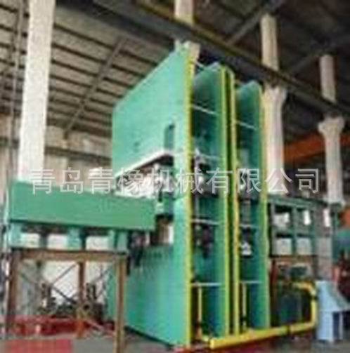 1000T双侧推拉模框式平板硫化机