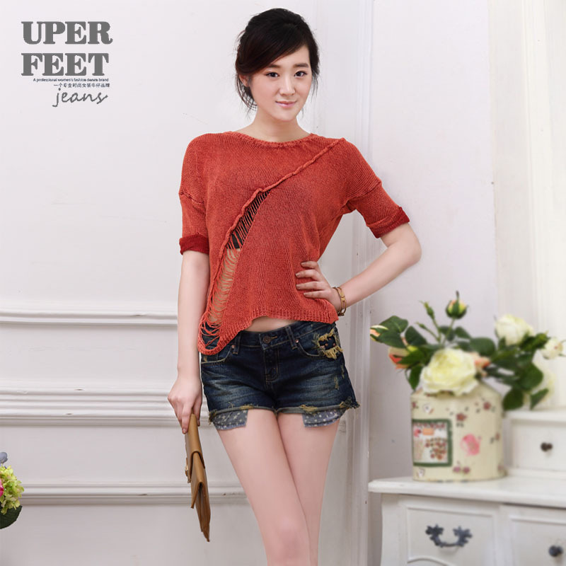 超步 秋冬韩版 深色破洞提臀<em>露袋</em>毛边<em>牛仔短裤</em>