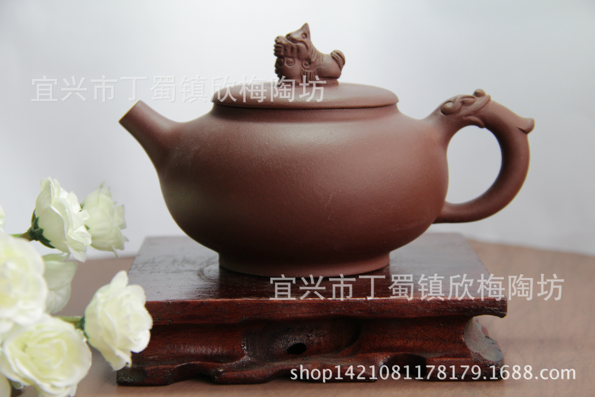00 品牌 欣梅陶艺 产品类别 茶壶 货号 034 材质 紫砂 规格 220ml