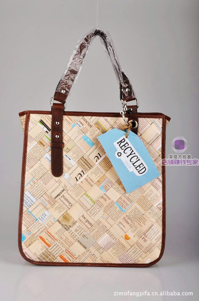 紫魔方批发 美国原单低碳环保**报纸包 时尚女士特色手提包批发