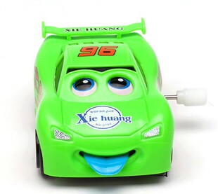 卡通会转弯眼睛舌头会动的多功能上链发条小汽车玩具