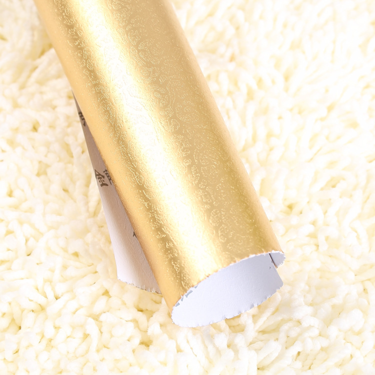 10年厂家供应125克铜板铝箔压纹纸 亮金色腾条纹包装纸批发