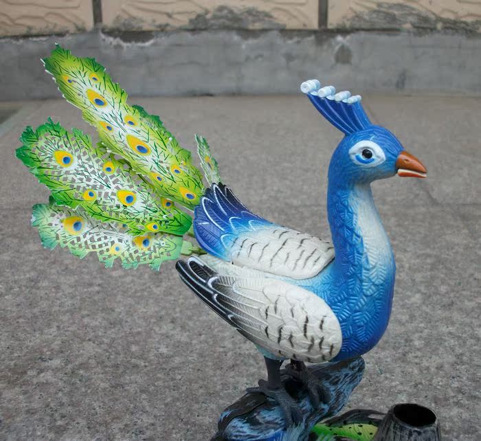 批发911声控动感孔雀 趣味仿真发声动物新奇特玩具 带笔筒