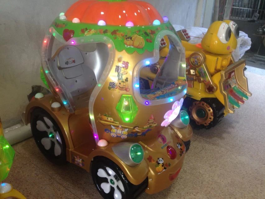  最新儿童投币摇摆机 南瓜车 &nbsp; 颜色: &nbsp;红 &nbsp;黄 &