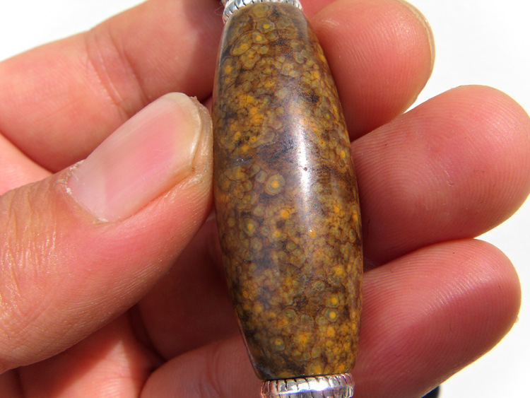 千眼天珠真品天珠西藏老勒子纯天然千年九眼原石项链吊坠宗教念佛图片