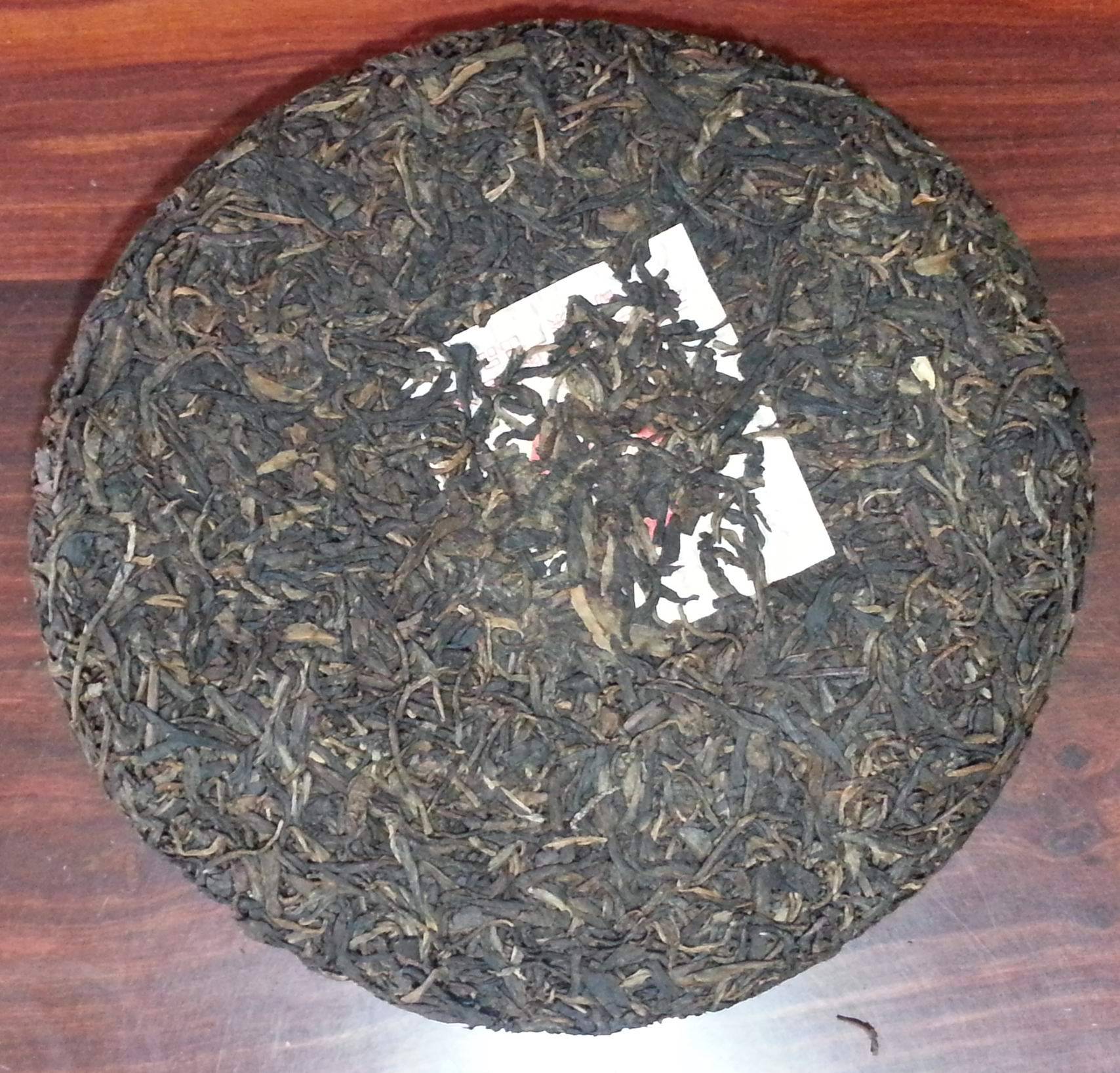 特价云南特产陈年大益7542纯干仓普洱生茶 大益七子饼 大益普洱茶图片