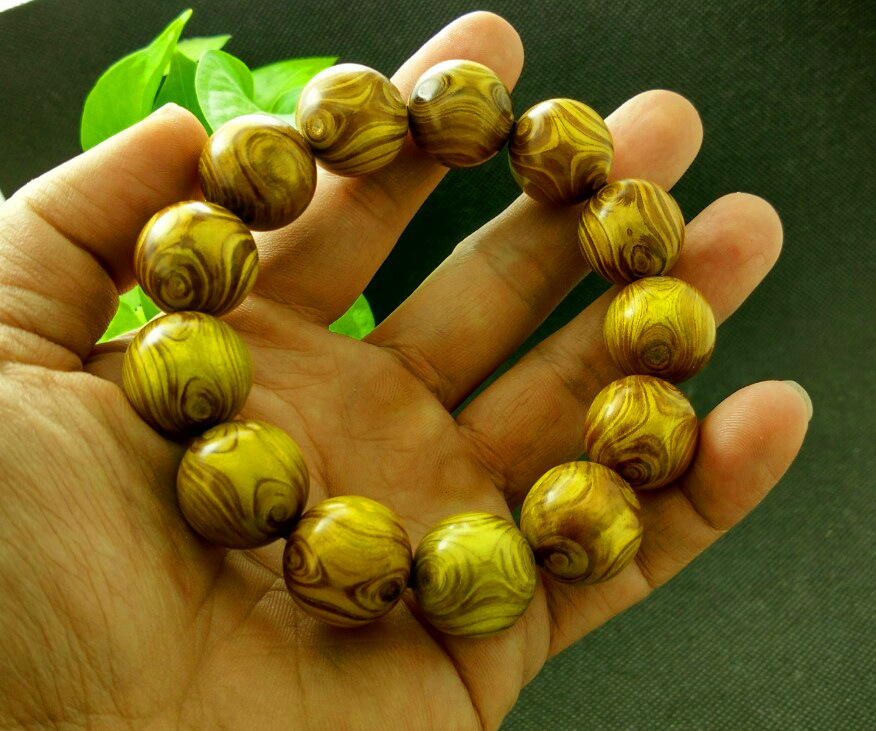 天然海南黄楠木手串 鬼脸双眼金丝楠护主转运佛珠手链 工艺品