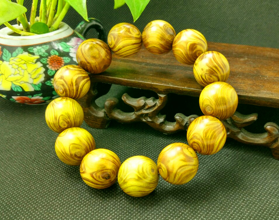 天然海南黄楠木手串 极品鬼脸双眼金丝楠护主转运佛珠手链 工艺品